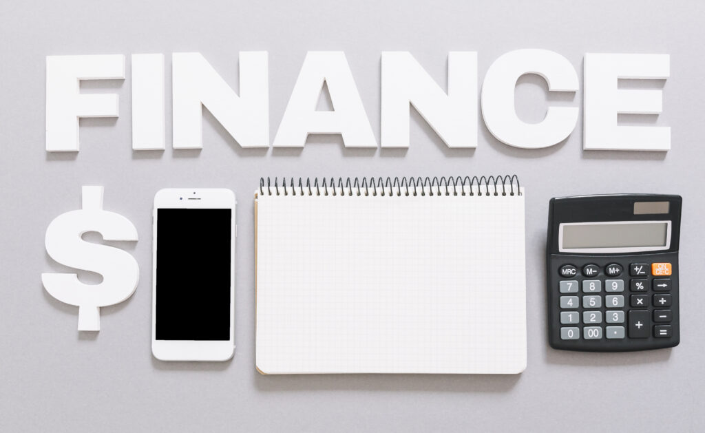 “Professional calculator with financial charts and graphs for understanding cost of capital”